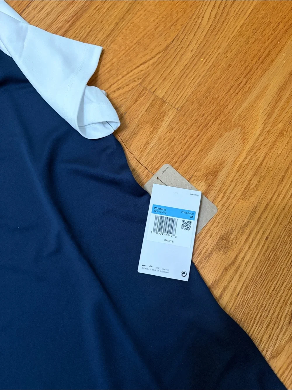 Nike Navy and White V‑Neck Raglan Athletic Shirt